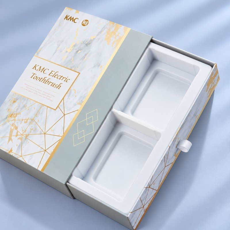 Molded pulp insert inside sliding drawer packaging